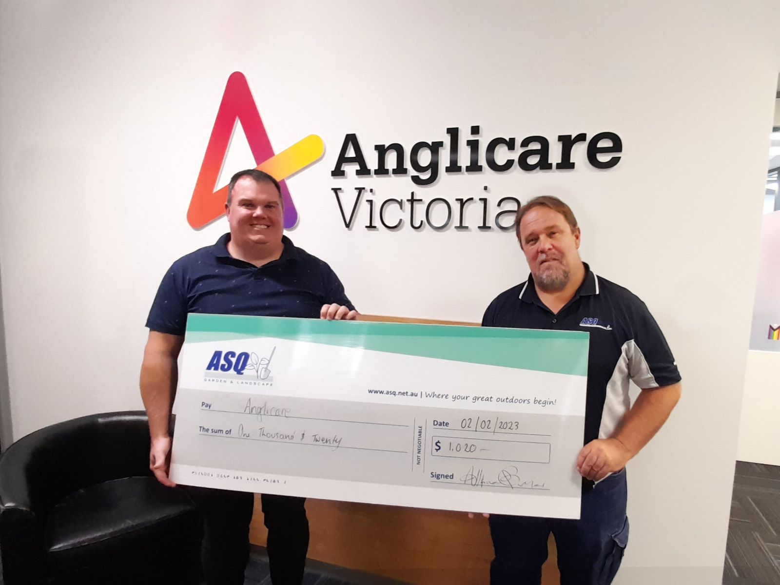 Terry presents donation to Anglicare